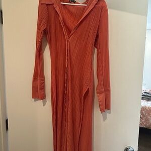 Long orange blouse with slit